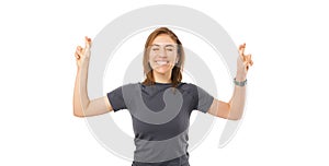 Portrait of young fitness sport woman crossing fingers and wishing