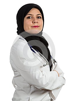 Portrait of young friendly beautiful muslim female doctor smiling