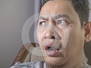 Young Man Shocked with Mouth Open