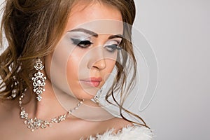 Portrait of a young girl with fashion hairstyle and make-up