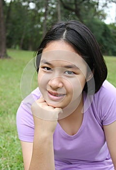 Portrait of young girl having a good time in the park