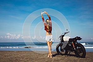 Portrait young girl on motorbike