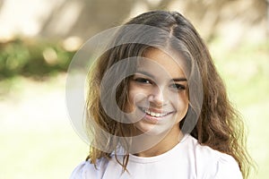 Portrait Of Young Girl In Park