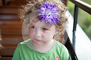 Portrait of young girl riding on train