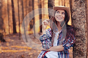 Portrait young girl at sunny forest