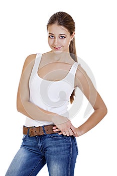 Portrait of a young girl teenager in blue jeans