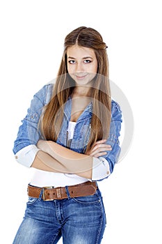 Portrait of a young girl teenager in jeans jacket and blue jeans