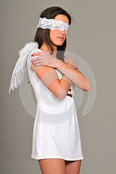 Portrait of girl with white angel wings