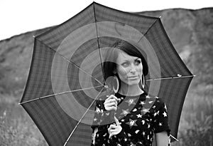 Portrait of a young glamour girl with umbrella,