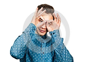 Portrait young guy dressed blue shirt. man open his eyes wide hands fingers smiling. isolated white background