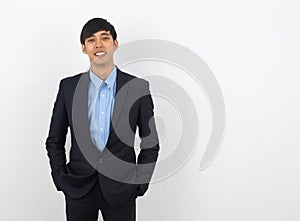 Portrait of Young handsome asian business man isolated on white background.