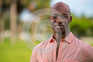 Portrait young handsome businessman with pink button shirt unbuttoned