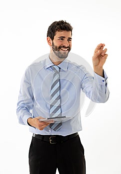 Portrait of a young handsome and confident businessman pointing as touching virtual screen