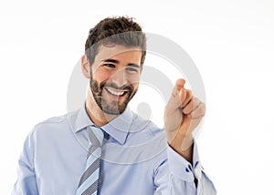 Portrait of a young handsome and confident businessman pointing as touching virtual screen