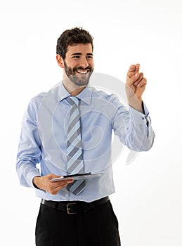 Portrait of a young handsome and confident businessman pointing as touching virtual screen