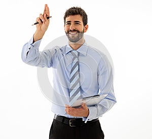 Portrait of a young handsome and confident businessman pointing as touching virtual screen