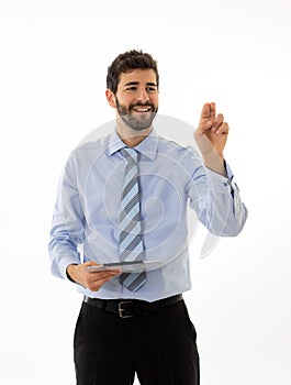 Portrait of a young handsome and confident businessman pointing as touching virtual screen