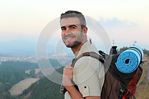 Portrait of a young handsome wanderer man