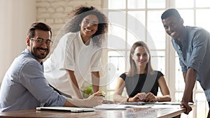 Portrait of young happy mixed race group of professionals.