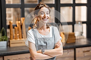 Saleswoman at the cafe or confectionery shop photo