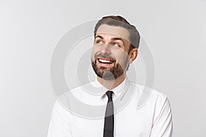 Portrait of young happy smiling business man, isolated over white background