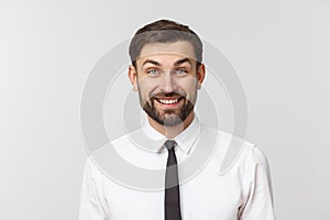 Portrait of young happy smiling business man, isolated over white background