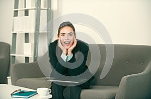Portrait of young happy smiling businesswoman accountant in formal wear at office work place. Successful female manager