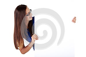 Portrait young happy woman with blank board