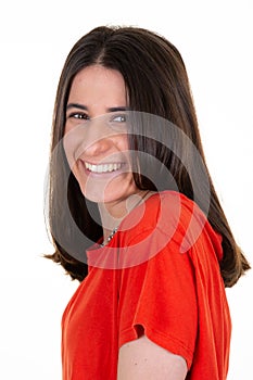 portrait of young happy woman looks side profile in camera