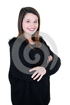 Portrait of a young happy woman smiling arms crossed on white background looking in camera