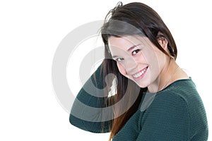 Portrait of a young happy woman smiling on white background