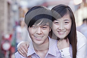 Portrait of Young Heterosexual Couple Smiling in Beijing