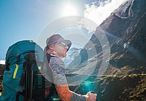 Portrait Young hiker backpacker man enjoying valley view in Makalu Barun Park route near Khare during high altitude