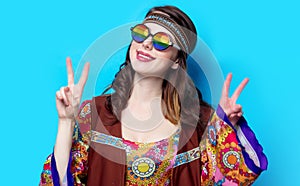 Portrait of Young hippie girl with rainbow glasses photo
