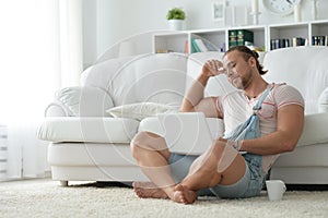 Portrait of young hipster man spending time with laptop at home