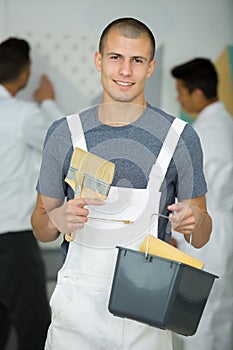 portrait young house painter and decorator apprentice