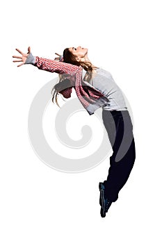 Portrait of young jumping girl in mid-air