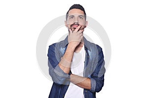 Portrait of young latin thoughtful man.