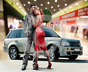 Portrait Young love Couple under Offroad car photo