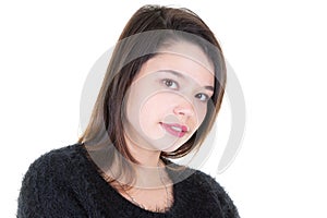 Portrait of young lovely woman with dark hair posing with kind smile isolated over white background