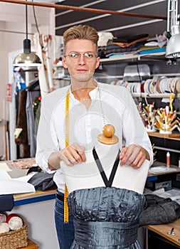 Portrait of young male fashion designer