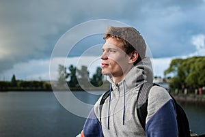 Portrait of young man against of blue sky