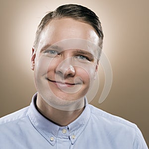 Portrait of a young man with big smile