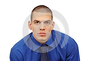 Portrait of young man at blue shirt and tie