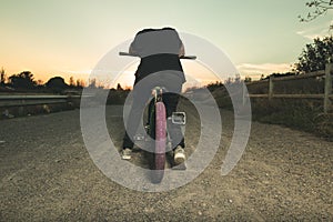 Portrait of a young man with a bmx bicycle