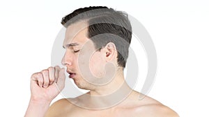 Portrait of young man coughing because of flu.
