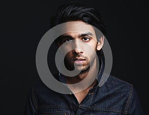 Portrait of a young man with denim jeans jacket