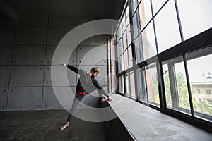 Portrait of young man doing physical exercise