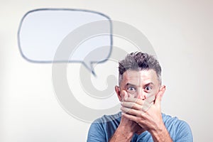 Portrait of a young man with a empty speech bubble over his head