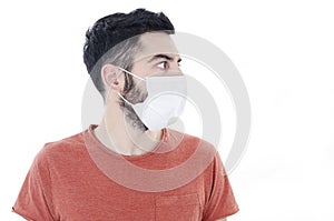 Portrait of young man with face mask looking side on copy space, 2019-nCoV.